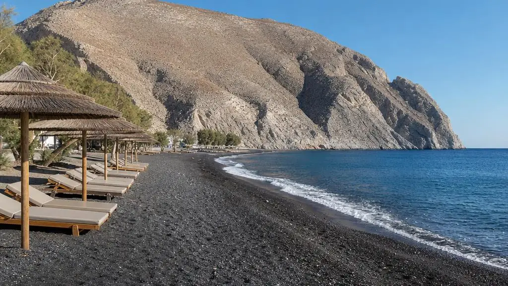 Perissa's dark volcanic beach on Santorini