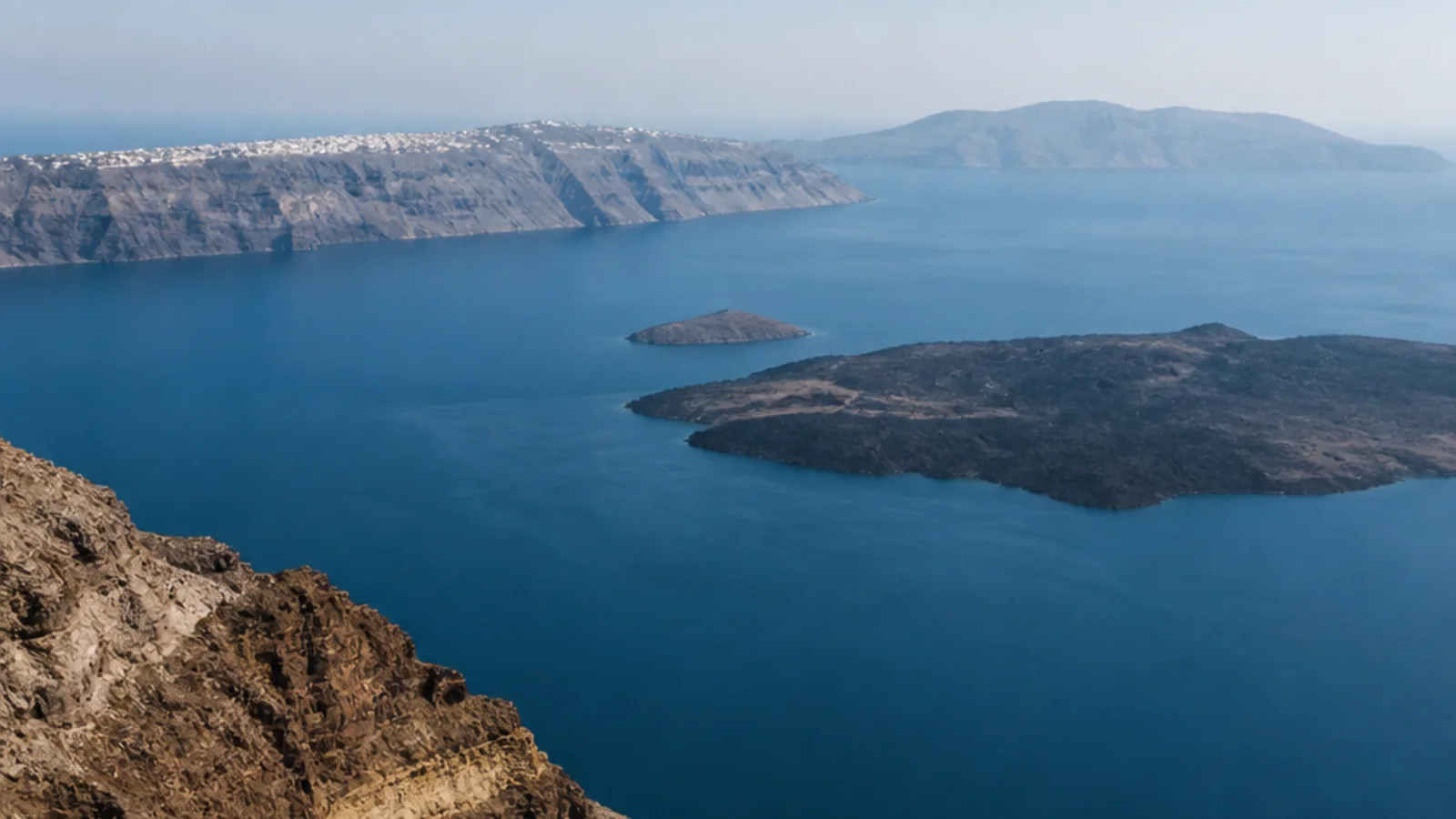 Santorini Caldera with Nea Kameni and Palea Kameni volcanic islands in the Aegean Sea